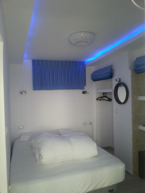 Holyland Apartments Йерусалим Стая снимка