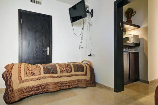 Holyland Apartments Йерусалим Стая снимка