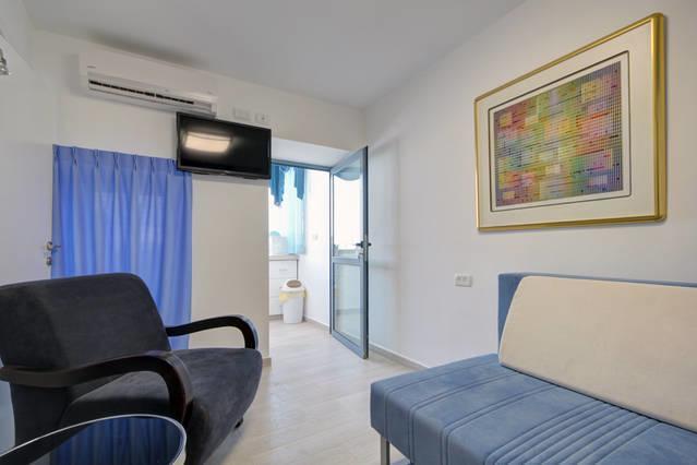 Holyland Apartments Йерусалим Стая снимка