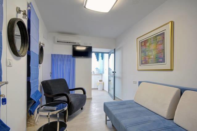 Holyland Apartments Йерусалим Стая снимка
